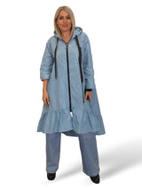 Capa de chuva com folhos