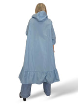 Capa de chuva com folhos