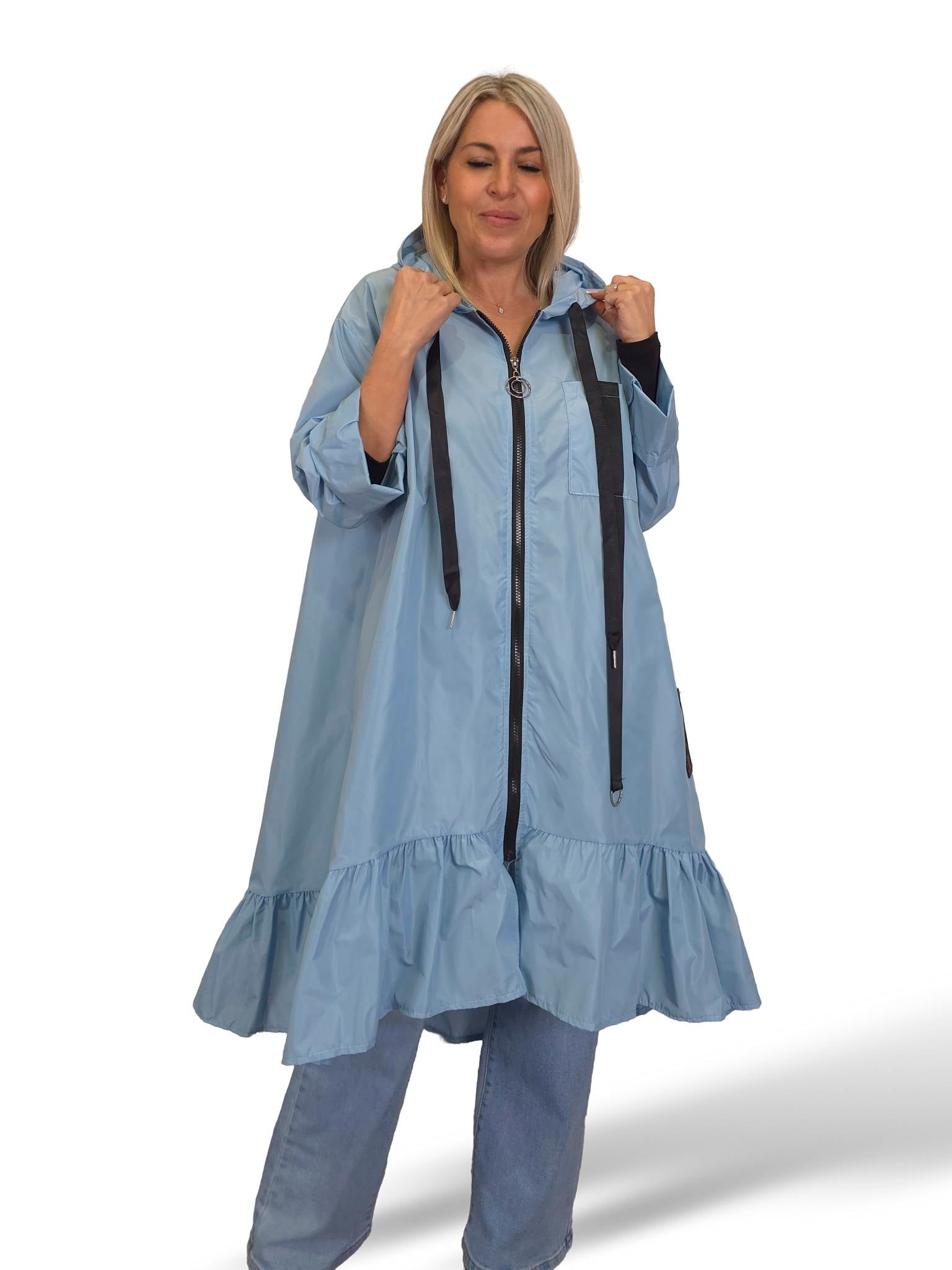 Capa de chuva com folhos