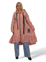 Capa de chuva com folhos