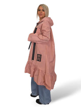 Capa de chuva com folhos