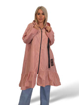 Capa de chuva com folhos