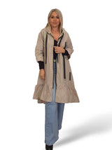 Capa de chuva com folhos