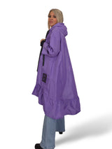 Capa de chuva com folhos