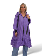Capa de chuva com folhos