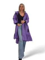 Capa de chuva com folhos