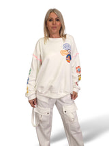 SUDADERA OVERSIZE MANGA FLOR