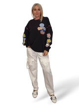 SUDADERA OVERSIZE MANGA FLOR