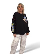 SUDADERA OVERSIZE MANGA FLOR