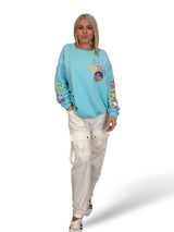 SUDADERA OVERSIZE MANGA FLOR