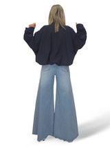 JEANS PALAZZO DESHILACHADO STRASS JOT