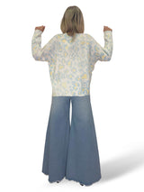 JERSEY PUNTO ANIMAL PRINT FLORES