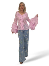 SPITZENBLUSE MIT RÜSCHEN UND V-AUSSCHNITT