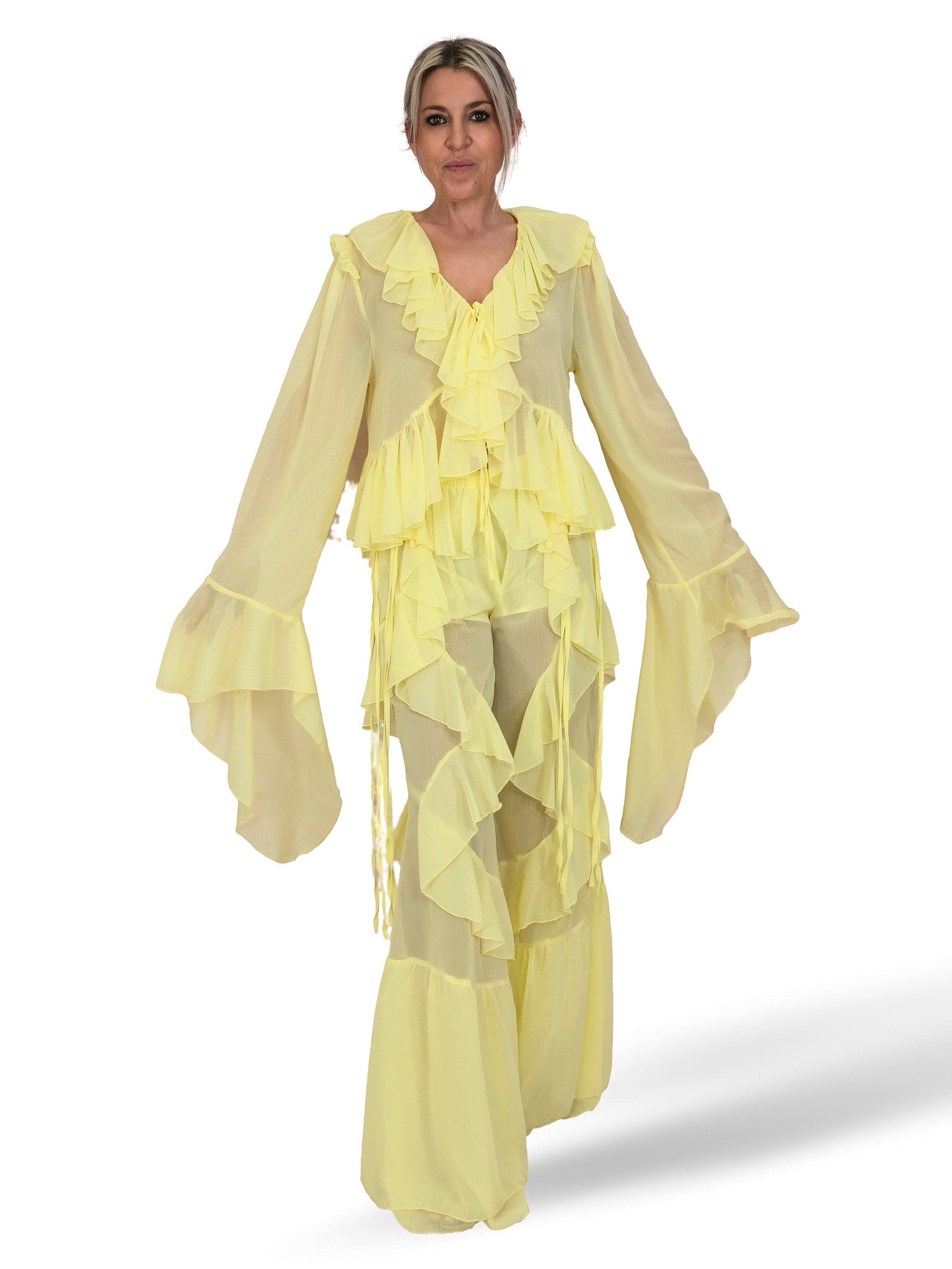 Completo composto da camicetta in chiffon e pantaloni con volant