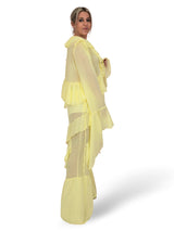 Completo composto da camicetta in chiffon e pantaloni con volant