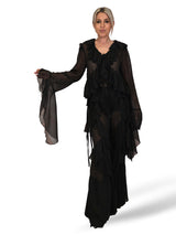 Completo composto da camicetta in chiffon e pantaloni con volant