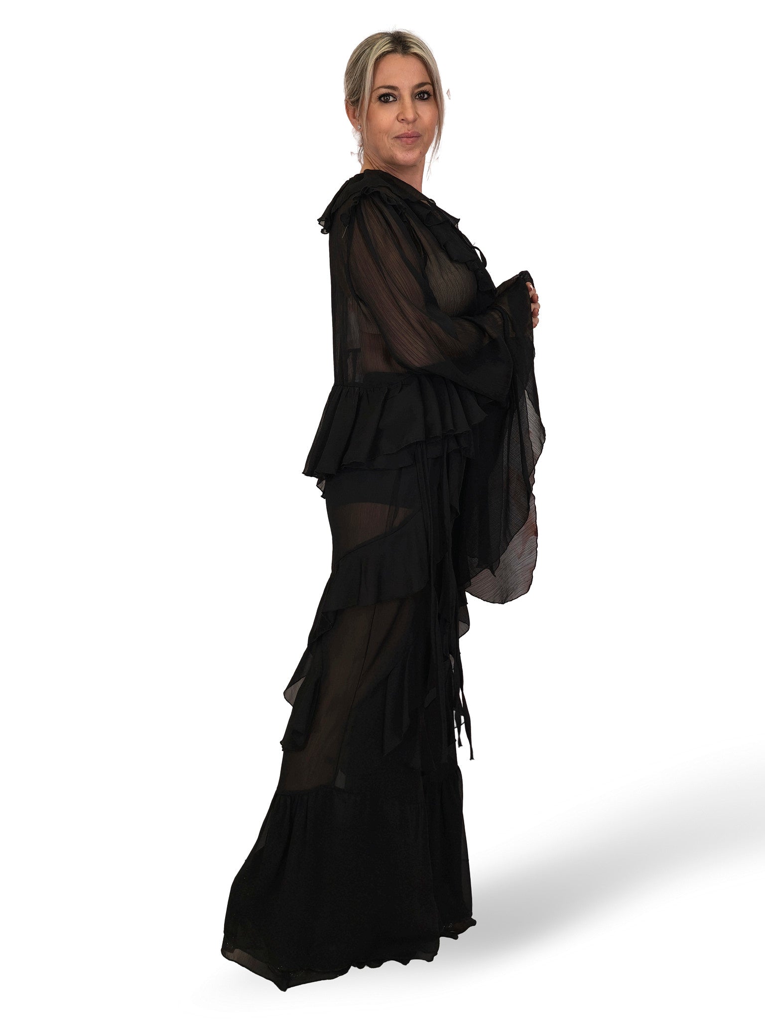 Completo composto da camicetta in chiffon e pantaloni con volant