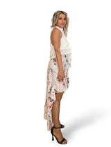 FALDA ASIMETRICA VOLANTES FLORES