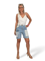 TOP Asimmetrico incrociato