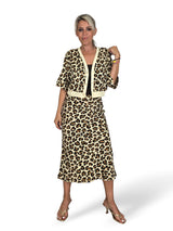 CONJUNTO ANIMAL PRINT STRASS