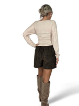 FALDA PANTALON TACHUELAS