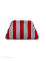 BOLSO CLUTCH RAYAS
