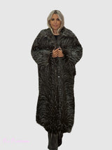 Casaco de pele dupla às riscas Lumina