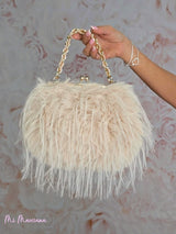 SAC DOUBLE EN FOURRURE AVEC BANDOULIÈRE TRESSÉE