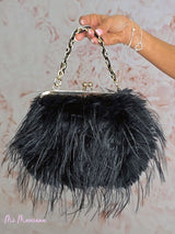 SAC DOUBLE EN FOURRURE AVEC BANDOULIÈRE TRESSÉE