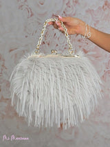 SAC DOUBLE EN FOURRURE AVEC BANDOULIÈRE TRESSÉE