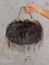 SAC DOUBLE EN FOURRURE AVEC BANDOULIÈRE TRESSÉE