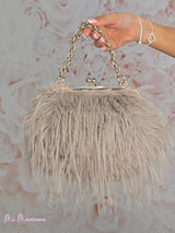 SAC DOUBLE EN FOURRURE AVEC BANDOULIÈRE TRESSÉE