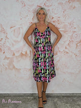 VESTIDO DE PAETÊS COM LETRAS JOT