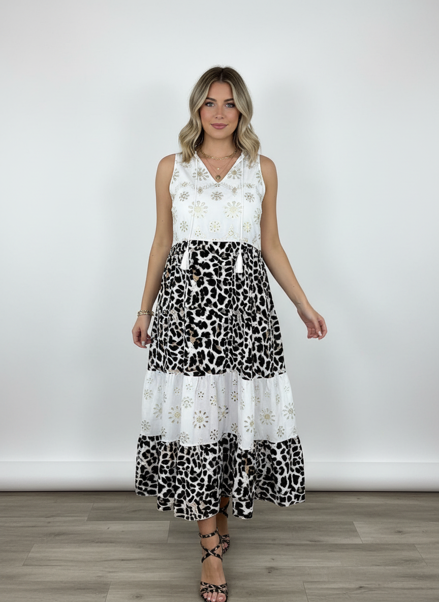 VESTIDO VOLANTES ANIMAL PRINT Y BORDADO INGLÉS