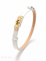 CINTURÓN DE PIEL CON HEBILLA PRIMAVERA AJUSTABLE